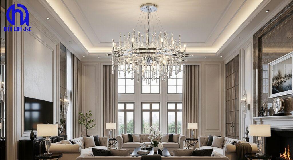 Các mẫu đèn trần phòng khách hiện đại đẹp thịnh hành 17 Đèn chùm pha lê hiện đại lấp lánh trong phòng khách sang trọng, trần nhà cao, nội thất đẳng cấp.